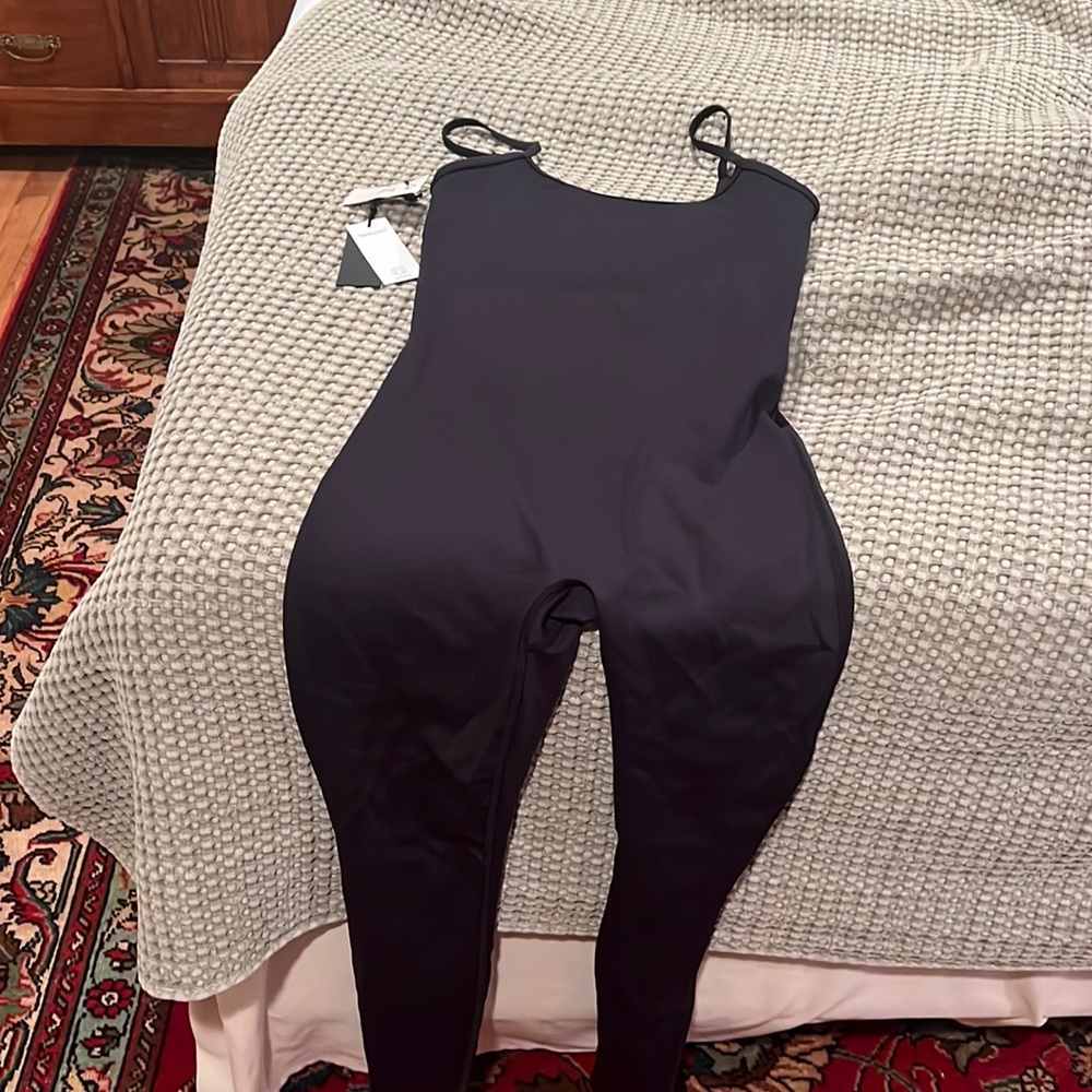 Aritzia workout jumpsuit! New with tags never worn! Just did not fit me right!